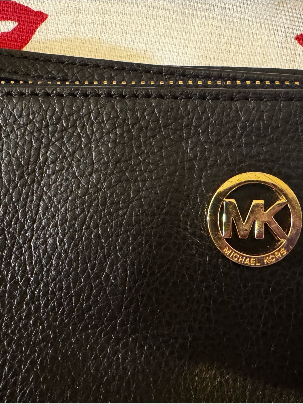 NWOT Michael Kors large black wristlet pebble Leather with Gold Logo. Classic .